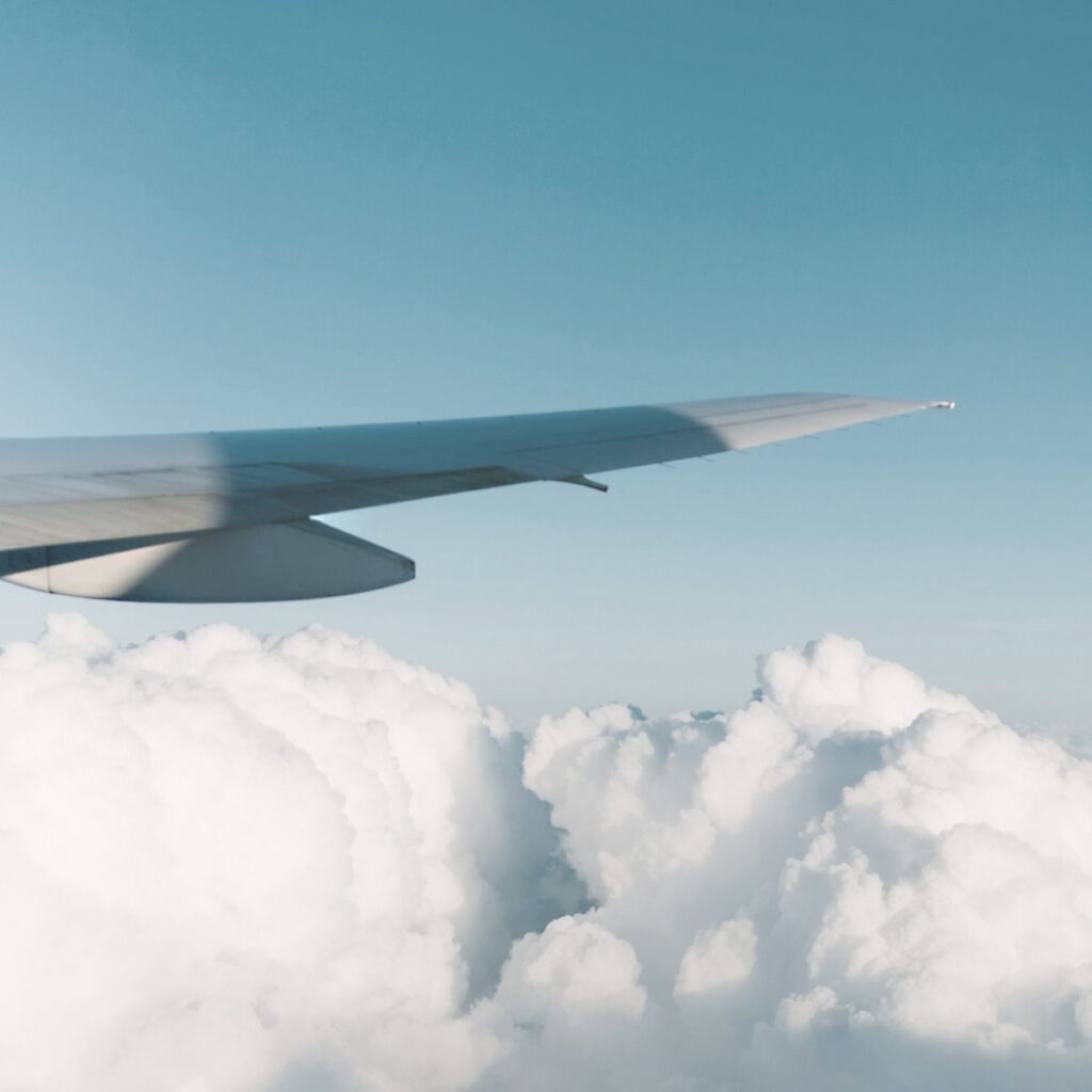 airplane wing in sky