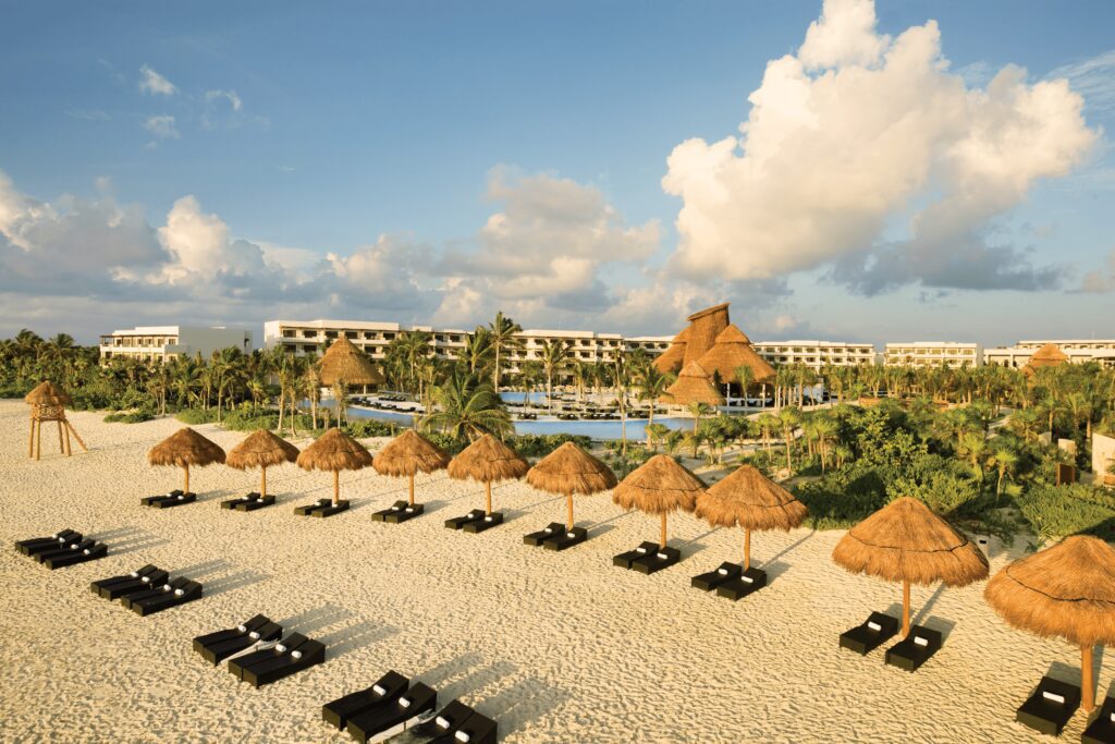 Secrets Maroma beach with umbrellas and loungers