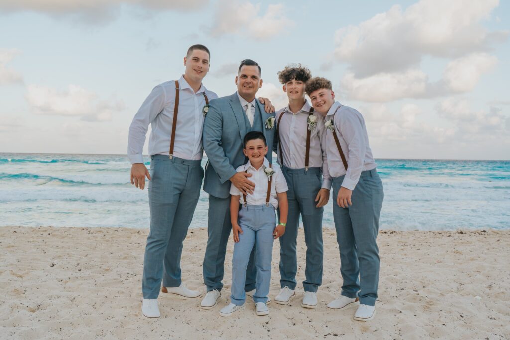 Groomsmen with grey suits & suspenders