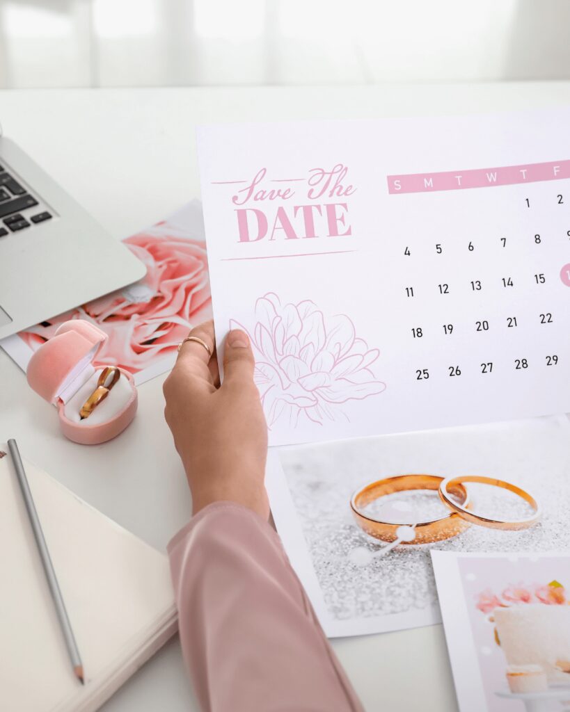 Wedding planner looking at a save the date calendar