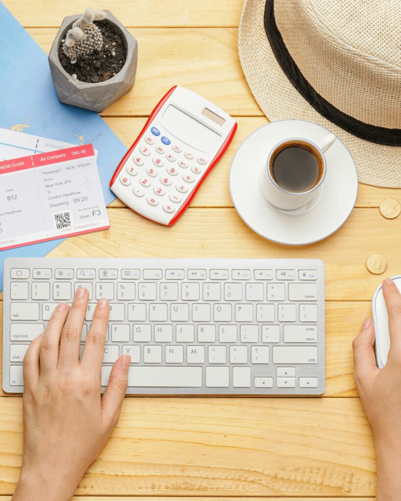 Destination wedding travel agent desk computer