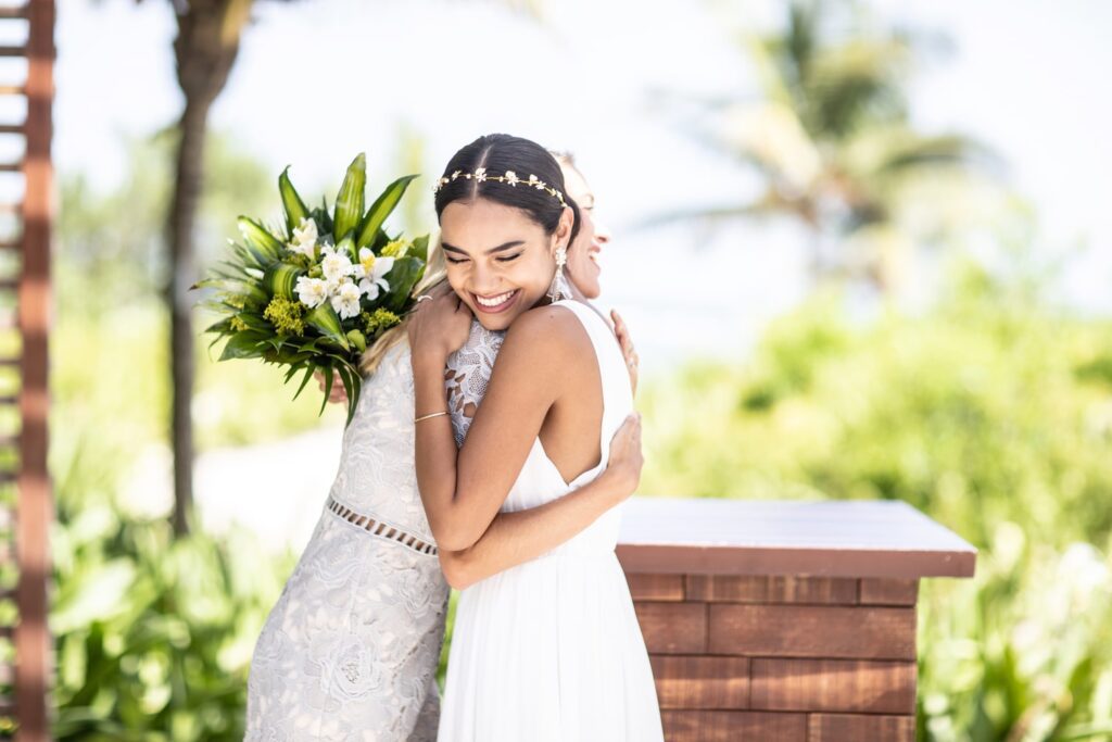 Bride hugging mother
