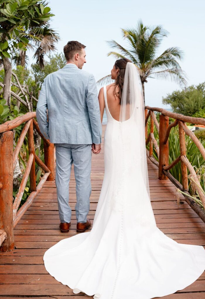 Bride and groom portraits on the UNICO 20°87° Riviera Maya board walk