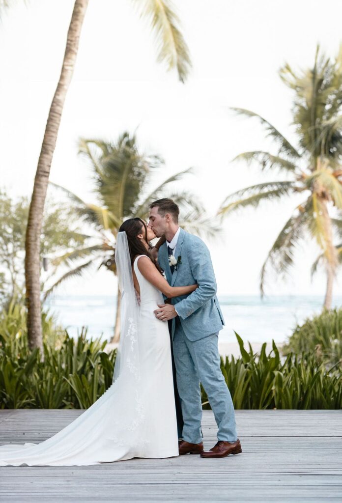 First kiss at UNICO 20°87° Riviera Maya Wedding ceremony