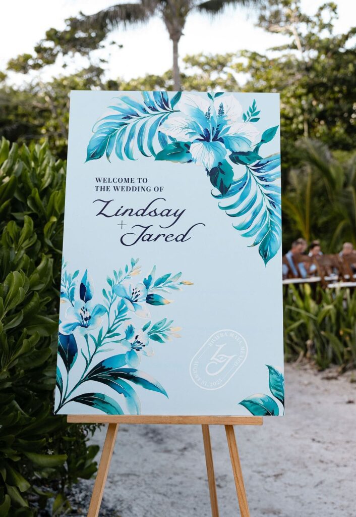 blue tropical flower wedding welcome signage