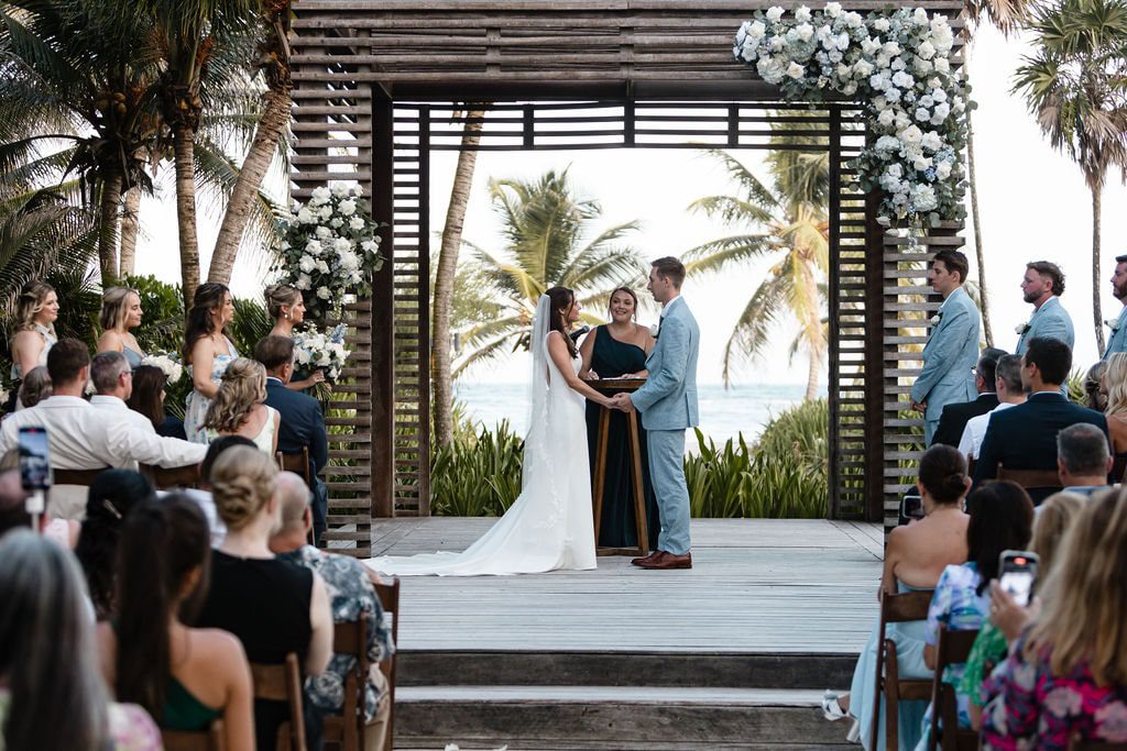 UNICO 20°87° Riviera Maya Wedding ceremony with arch and white flowers