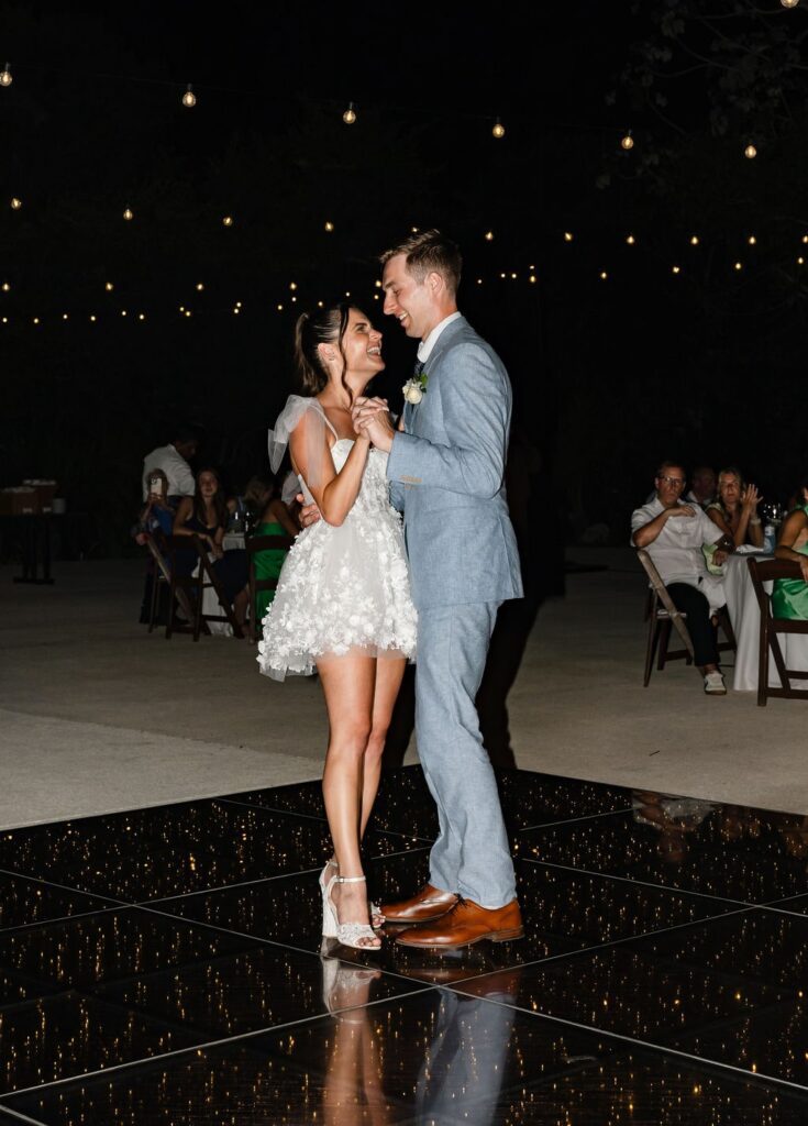 Bride and groom dancing on LED dance floor at UNICO 20°87° Riviera Maya Wedding