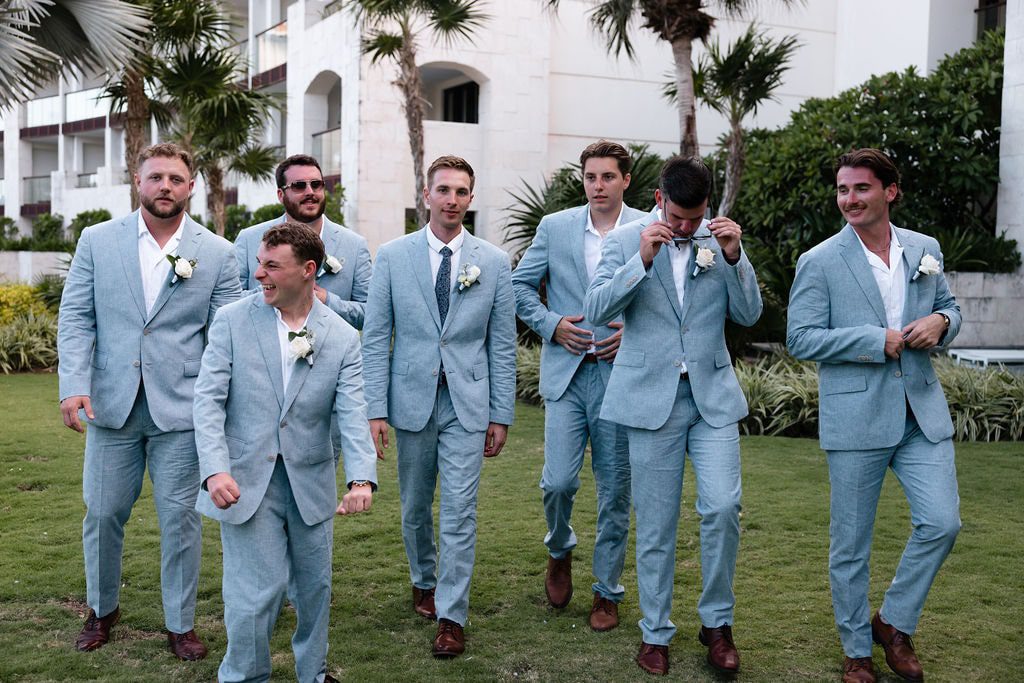 Groomsmen in light blue groomsmen suits