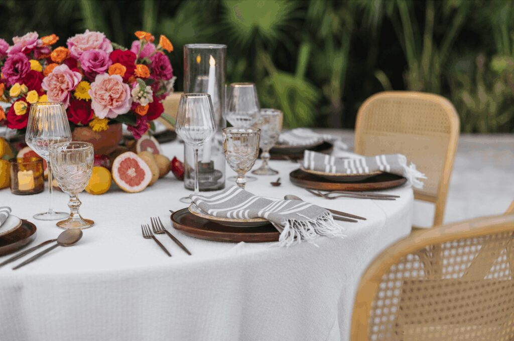 Vibrant florals and citrus wedding centrepiece at UNICO 20°87° Hotel Riviera Maya wedding