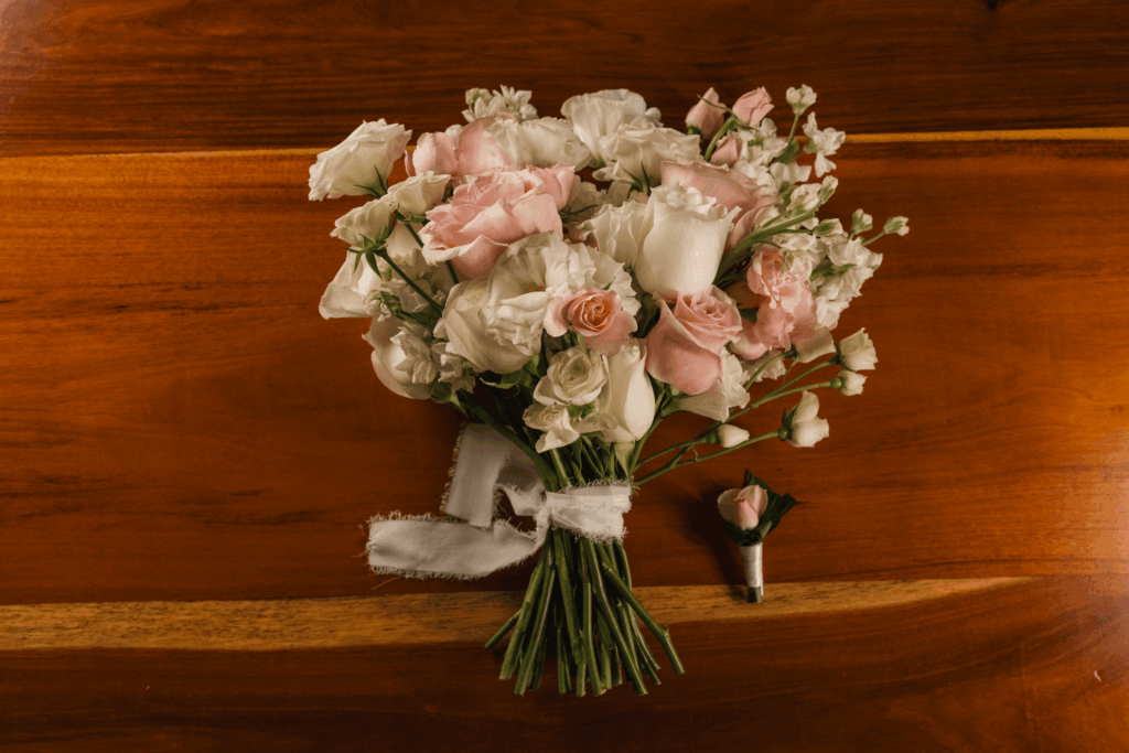 A pink an white bridal bouquet for a UNICO 20°87° Hotel Riviera Maya wedding