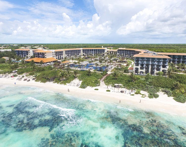 Aerial view of UNICO 20°87° Hotel Riviera Maya and the beach