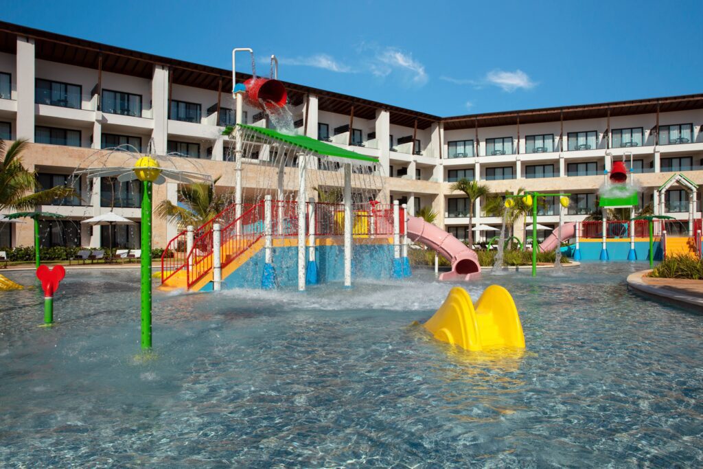 A water park in the pool at a family friendly All-Inclusive resort