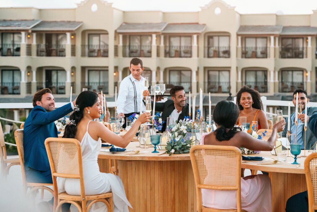 wedding guests toasting at Mexico wedding