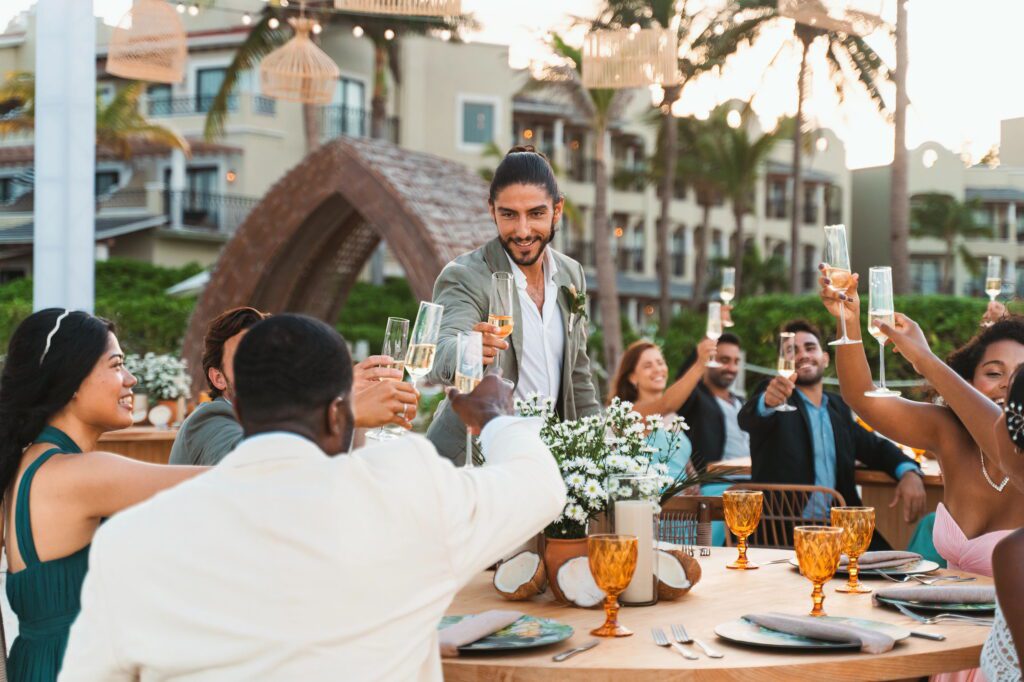 Wedding guests toasting drinks