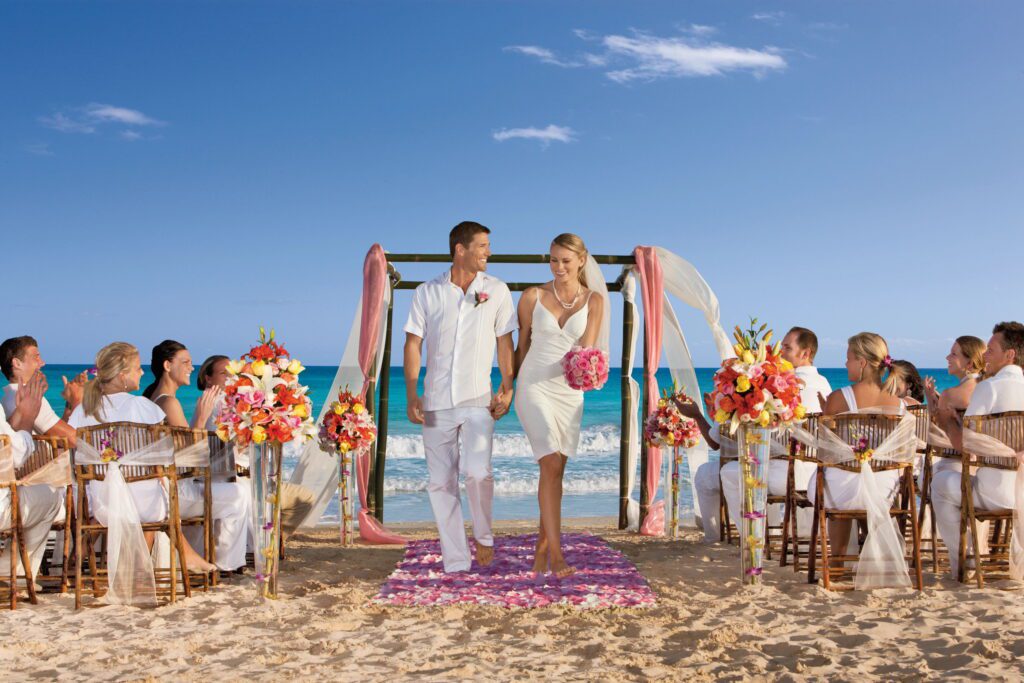 all inclusive wedding package beach ceremony photos of bride & groom