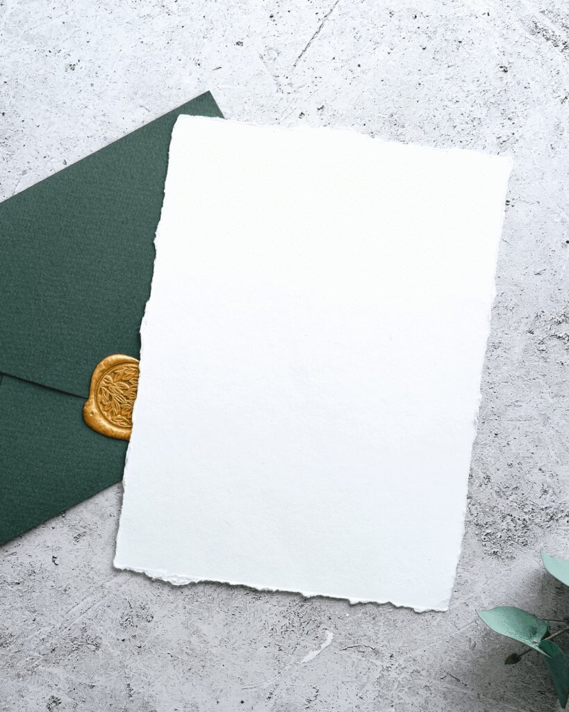 Wedding invitation with green envelope and gold wax seal wedding invitation with green envelope and gold wax seal