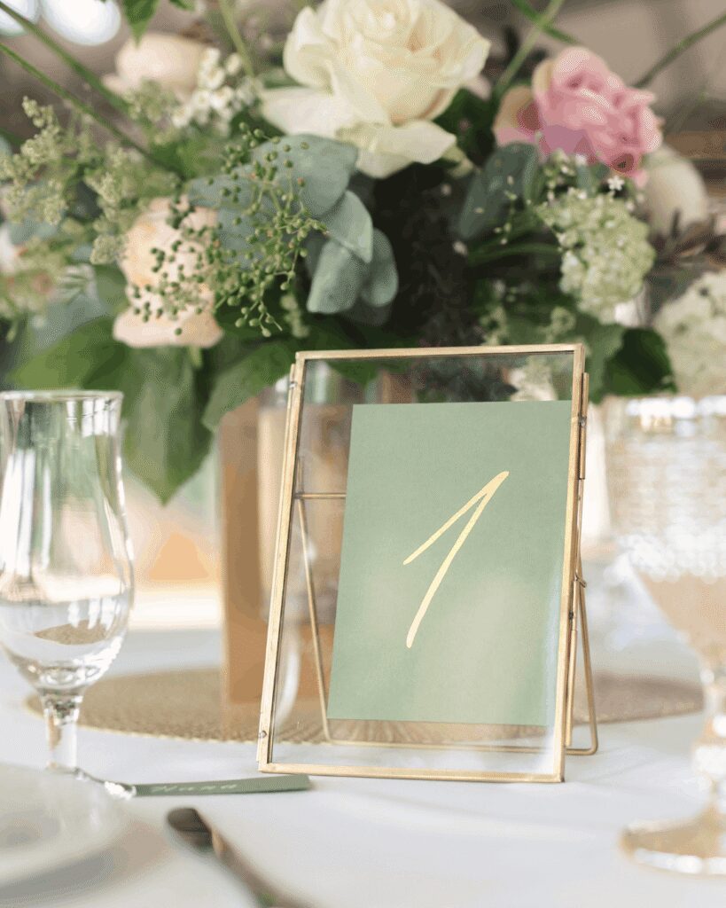 Green table number in gold frame" title="Green table number in gold frame Green table number in gold frame