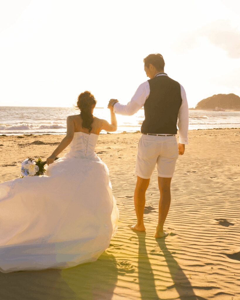 Bride and groom photos at sunset on the beach Bride and groom photos at sunset on the beach